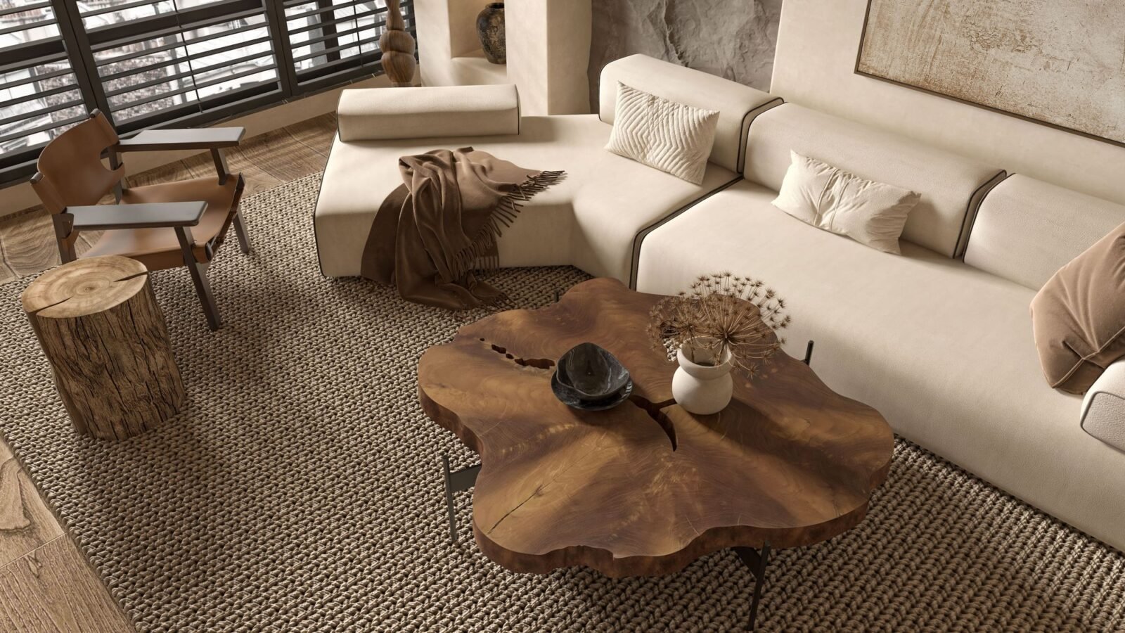 Neutral living room with plush sofa, textured rug, warm wood, and soft natural light.